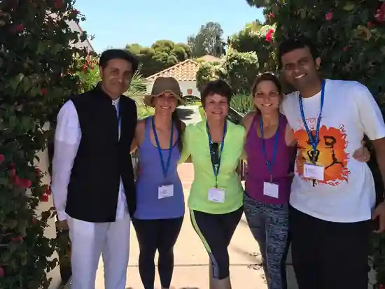 Dr. Suresh Devnani with a small group outdoors